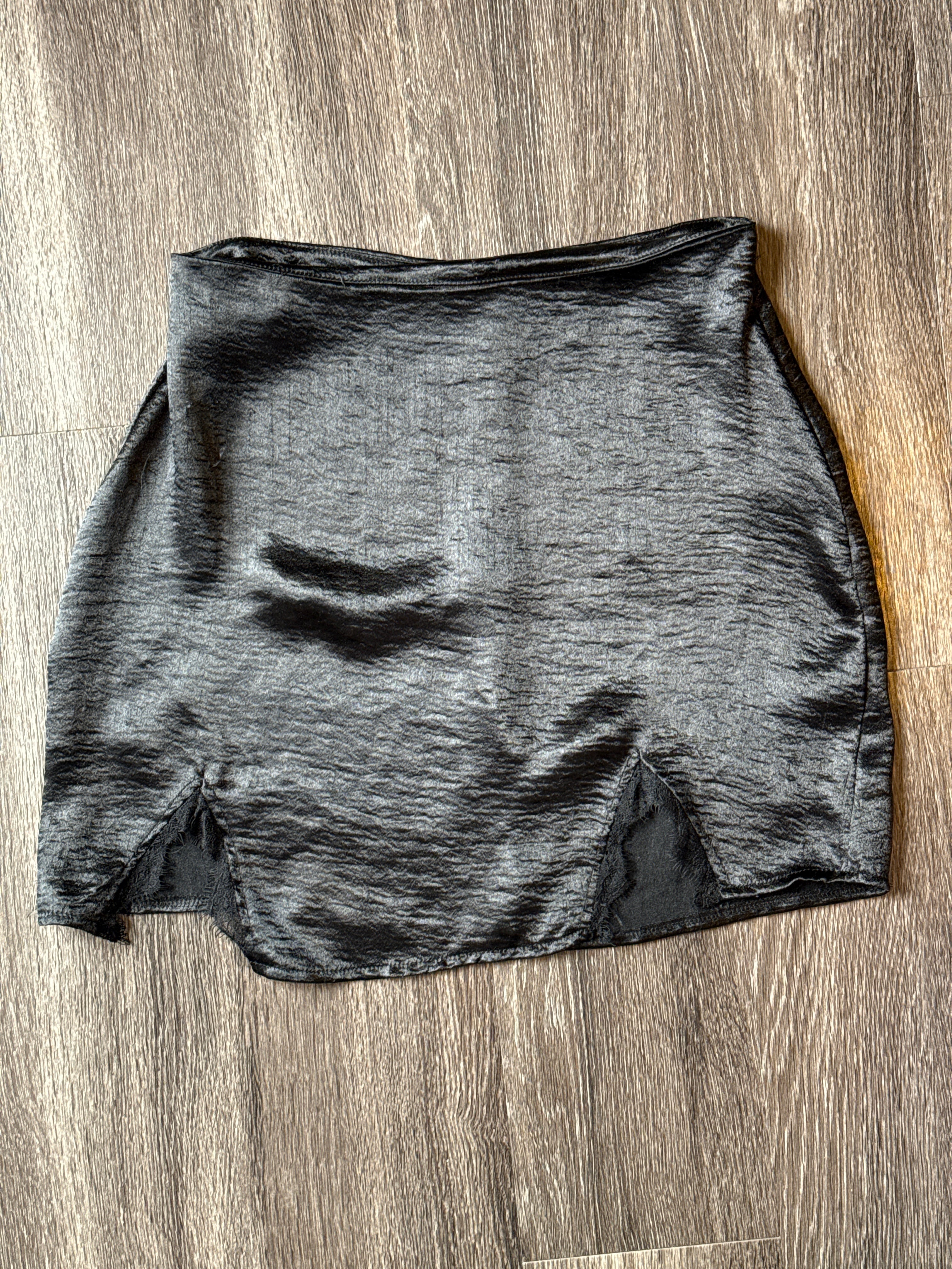 Black “torn” skirt